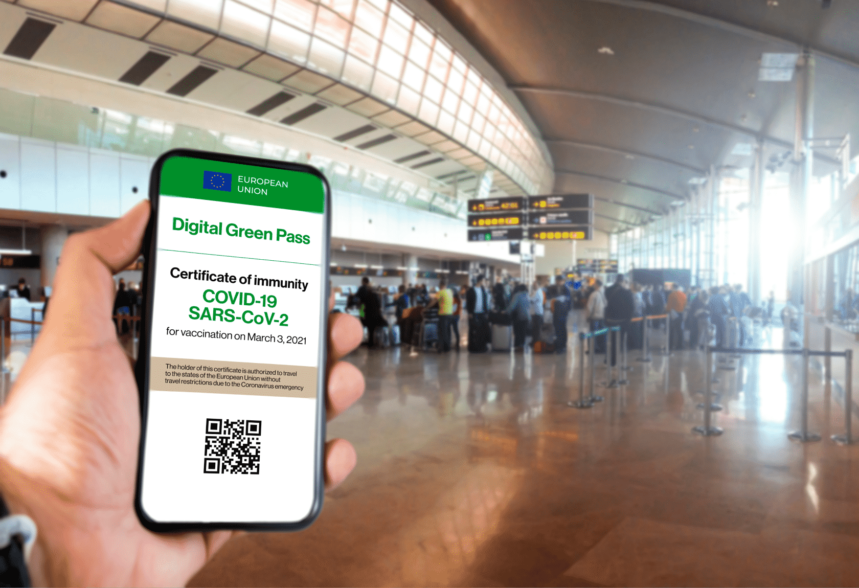 A person showing their digital EU Covid Certificate at an airport