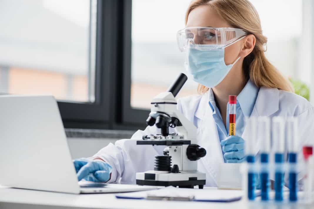 Scientist woman studying Omicron, the new Covid variant.