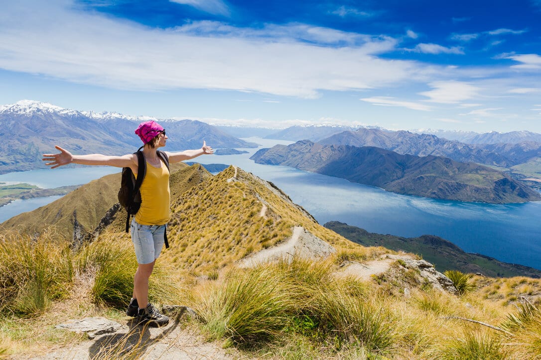 Tourist in a New Zealand mountain landscape.