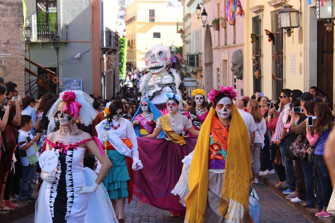 People celebrating Día de los Muertos in Mexico.